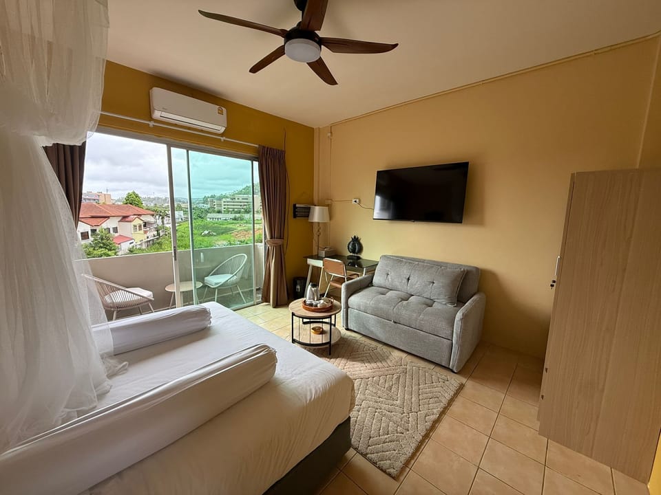 Deluxe Double Room, Balcony, Mountain View | Blackout drapes, iron/ironing board, free WiFi