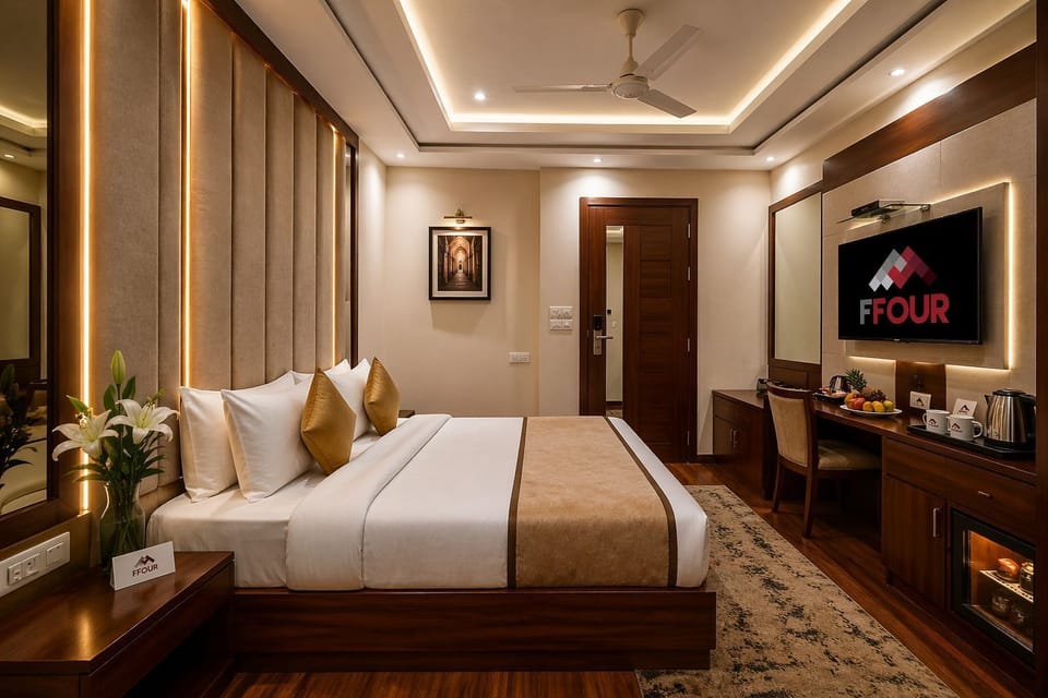Deluxe Room, City View | Minibar, desk, laptop workspace, iron/ironing board