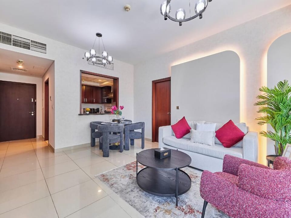 Premium Apartment, 1 Bedroom, Pool View | Living room | 55-inch Smart TV with cable channels