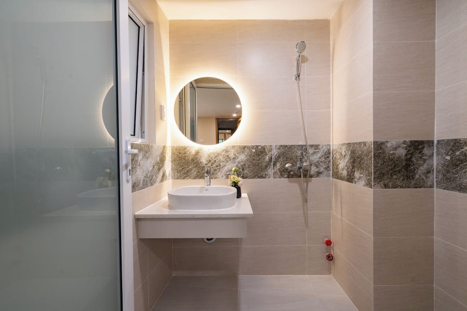 Standard Double Room | Bathroom | Shower, hair dryer, slippers, towels