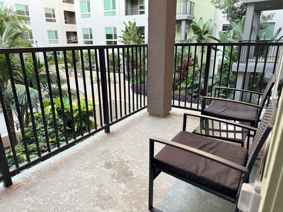 Enjoy stunning views of the iconic city from your own private balcony
