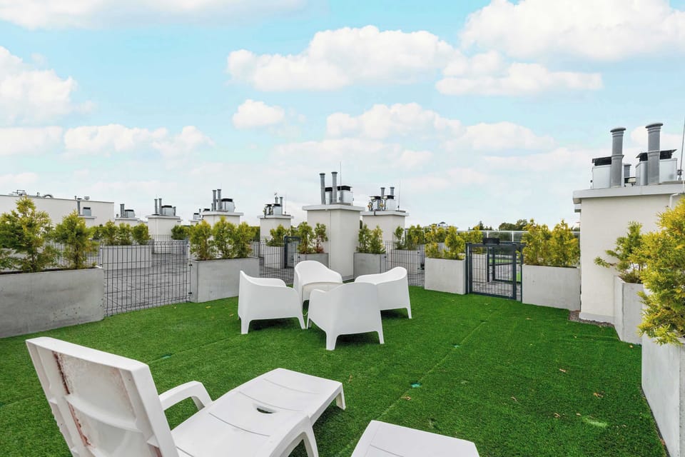 Relax on the furnished terrace's comfortable armchairs and enjoy the fresh air in the common space.