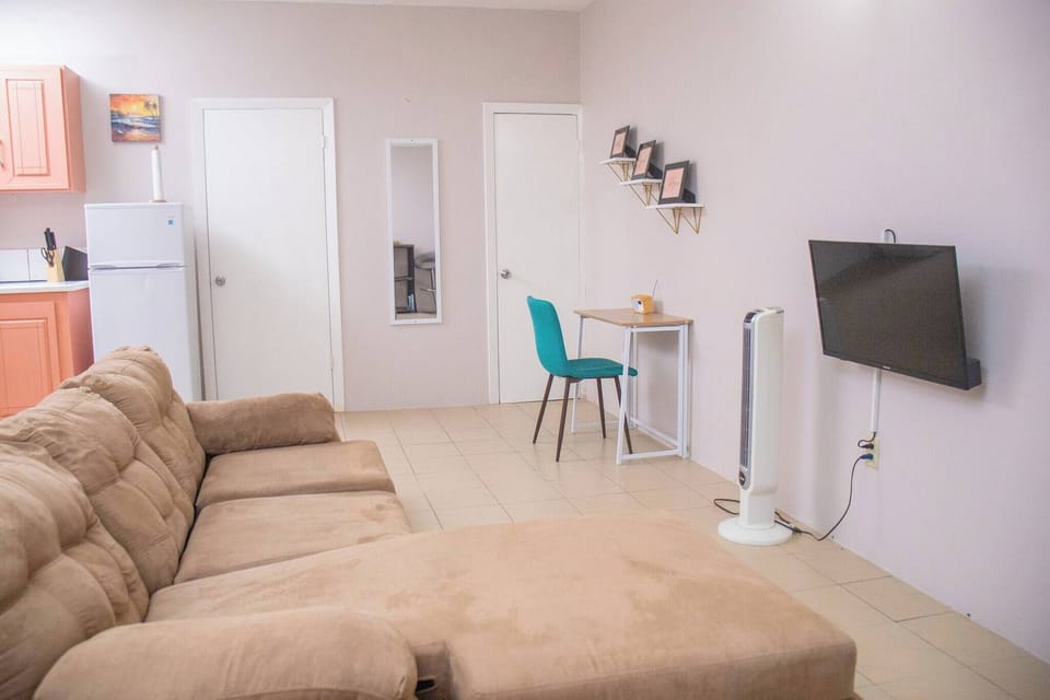 Apartment, 2 Bedrooms, Balcony, Garden View | Living room