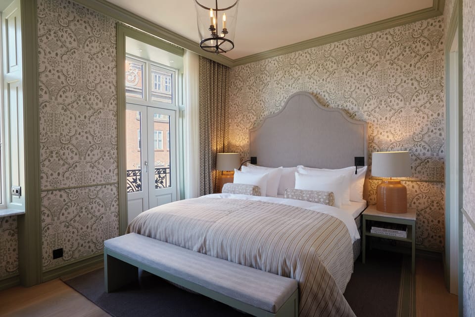 Premium bedding, down comforters, pillowtop beds, minibar