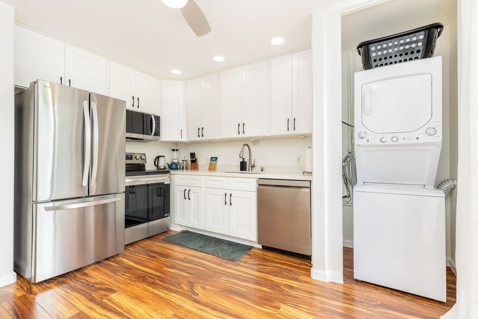 Kitchen with washer and dryer included