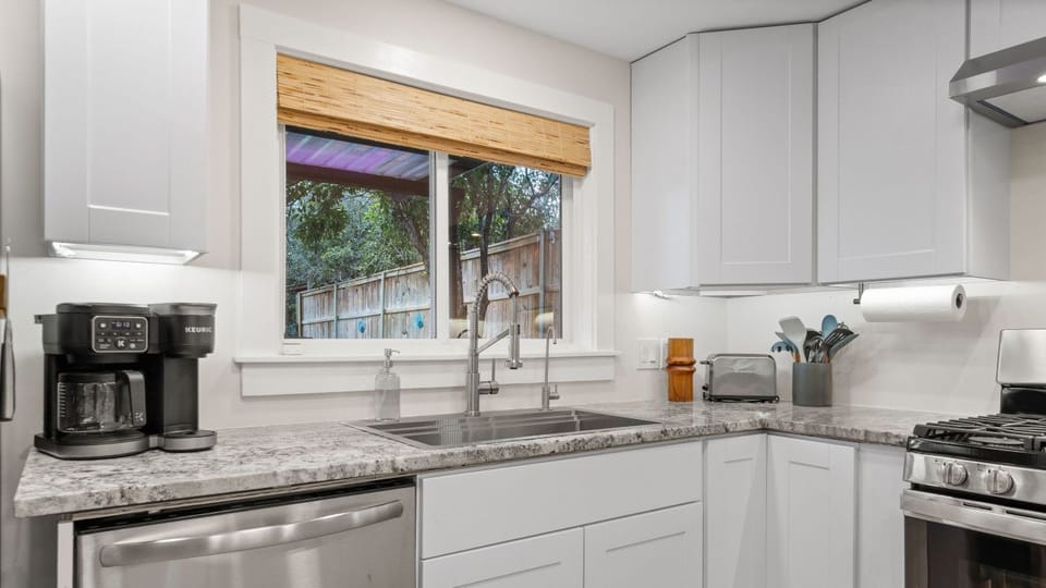 Start your day right with the dual Keurig and drip coffee maker, or wind down with a sunset view.