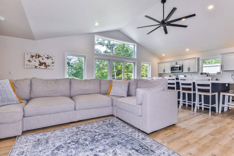 Never miss out on the conversation with this open living space.