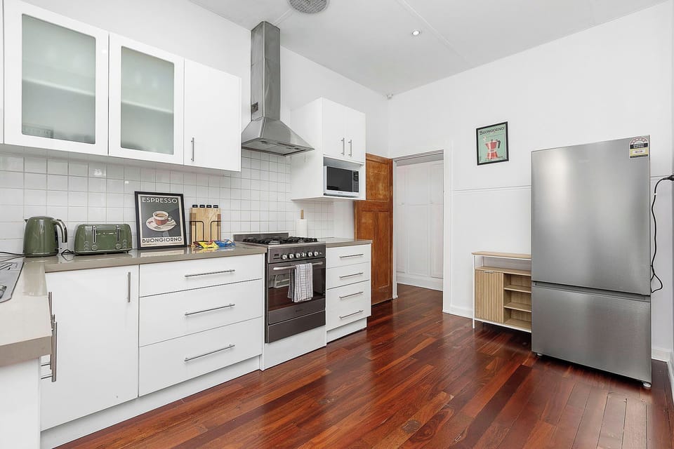 Cook in style! Enjoy a functional and fashionable kitchen with modern appliances, plenty of counter space, and a charming espresso theme.