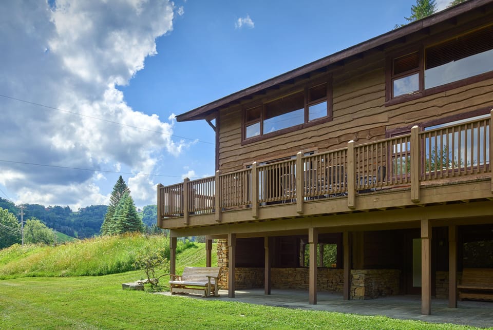 Tyrol chalets featuring a stunning backdrop amongst lush greenery.