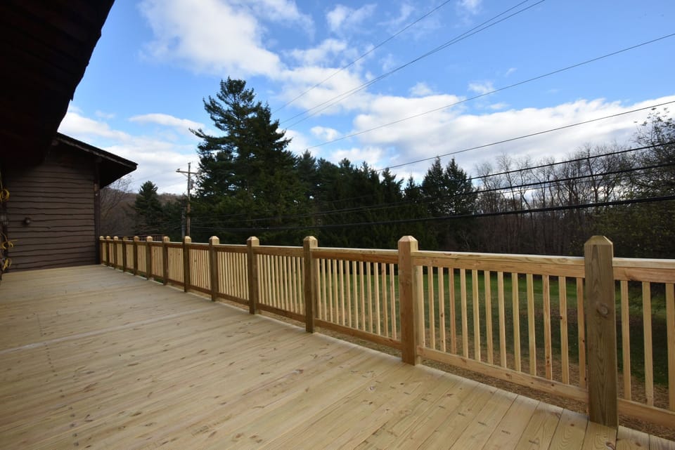 Expansive deck with scenic views, perfect for enjoying the outdoors and taking in the fresh air.