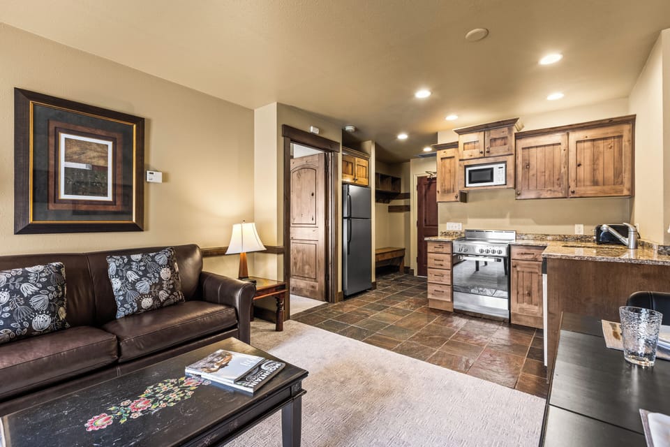 The open concept living area with efficient kitchen.