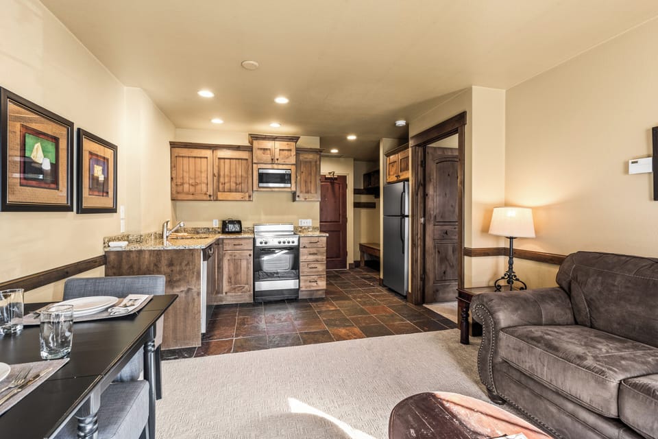 The open concept living area with efficient kitchen.