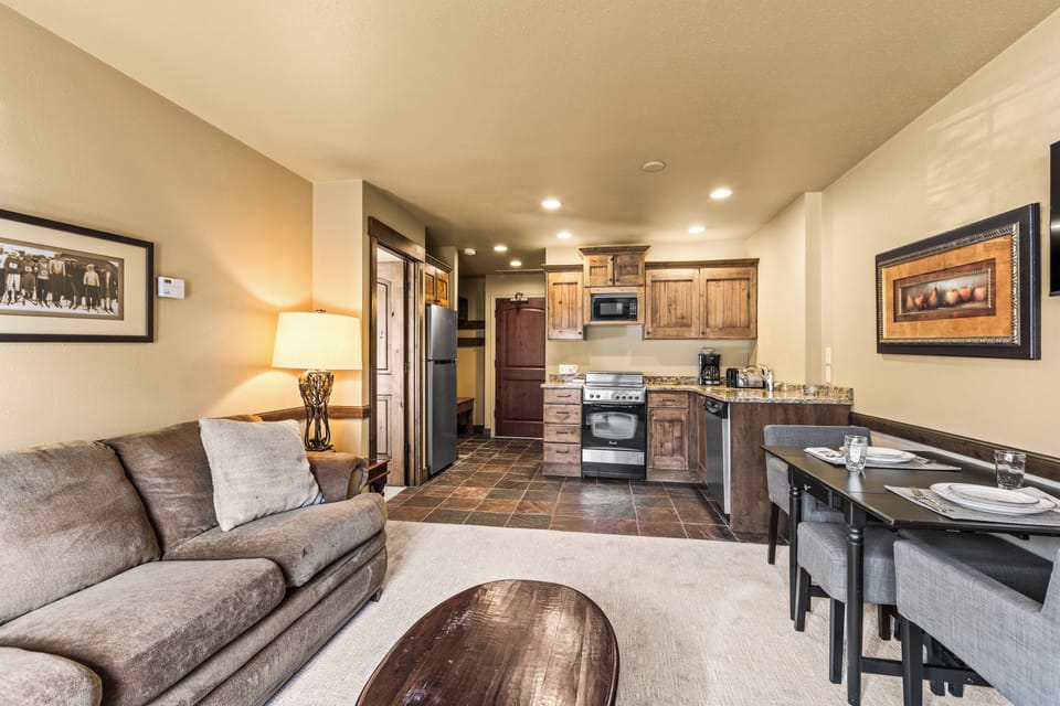 The open layout connecting your fully-equipped kitchen to the inviting living space, perfect for relaxing after adventures.