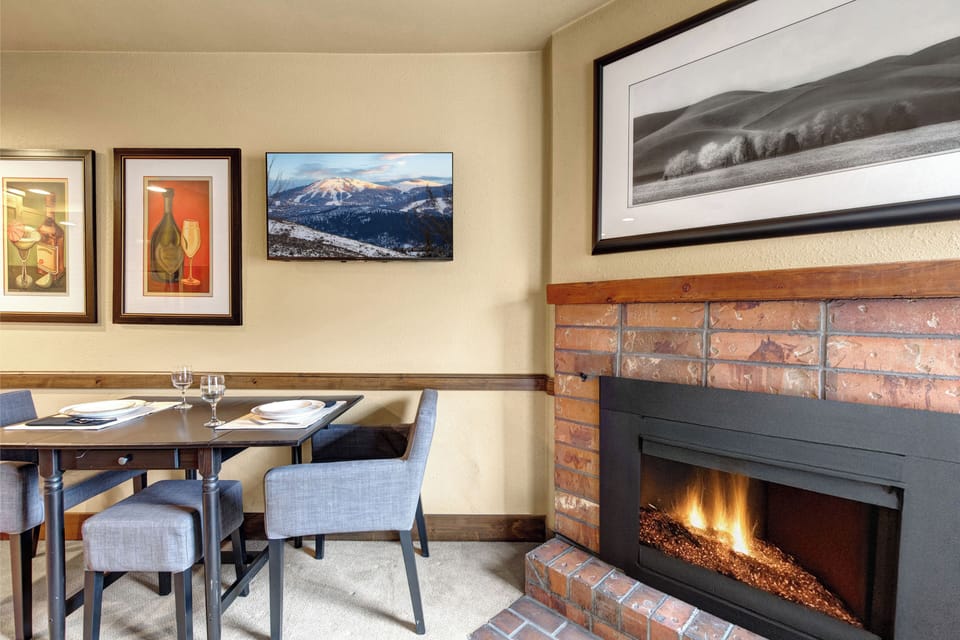 Cozy up to the crackling fireplace while you dine at your private table for two.