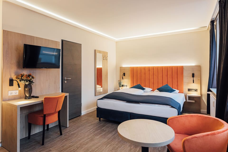 Standard Quadruple Room | Desk, laptop workspace, blackout drapes, soundproofing