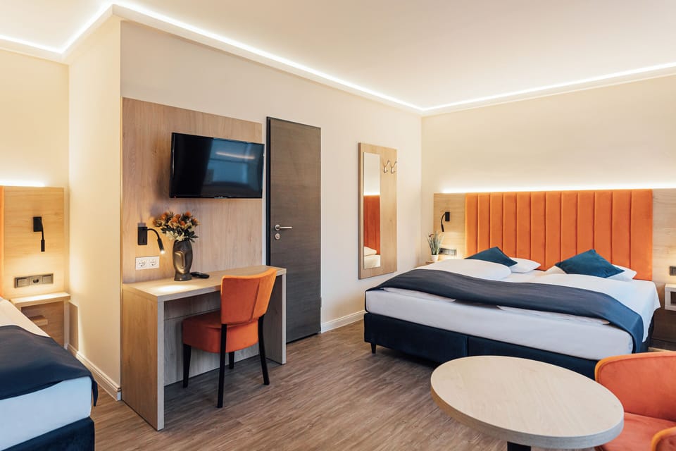 Standard Quadruple Room | Desk, laptop workspace, blackout drapes, soundproofing
