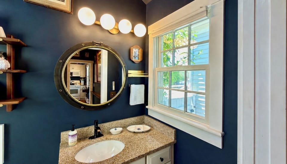 Prep at a spacious vanity with tons of natural light...