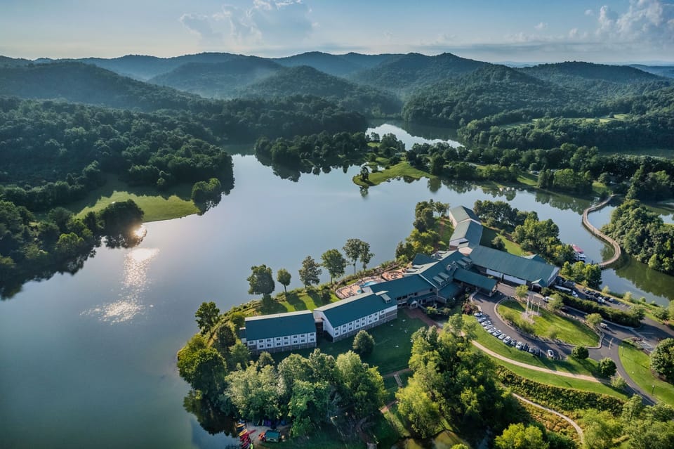 A peaceful aerial view reveals the resort’s perfect harmony with its lush, mountainous surroundings.