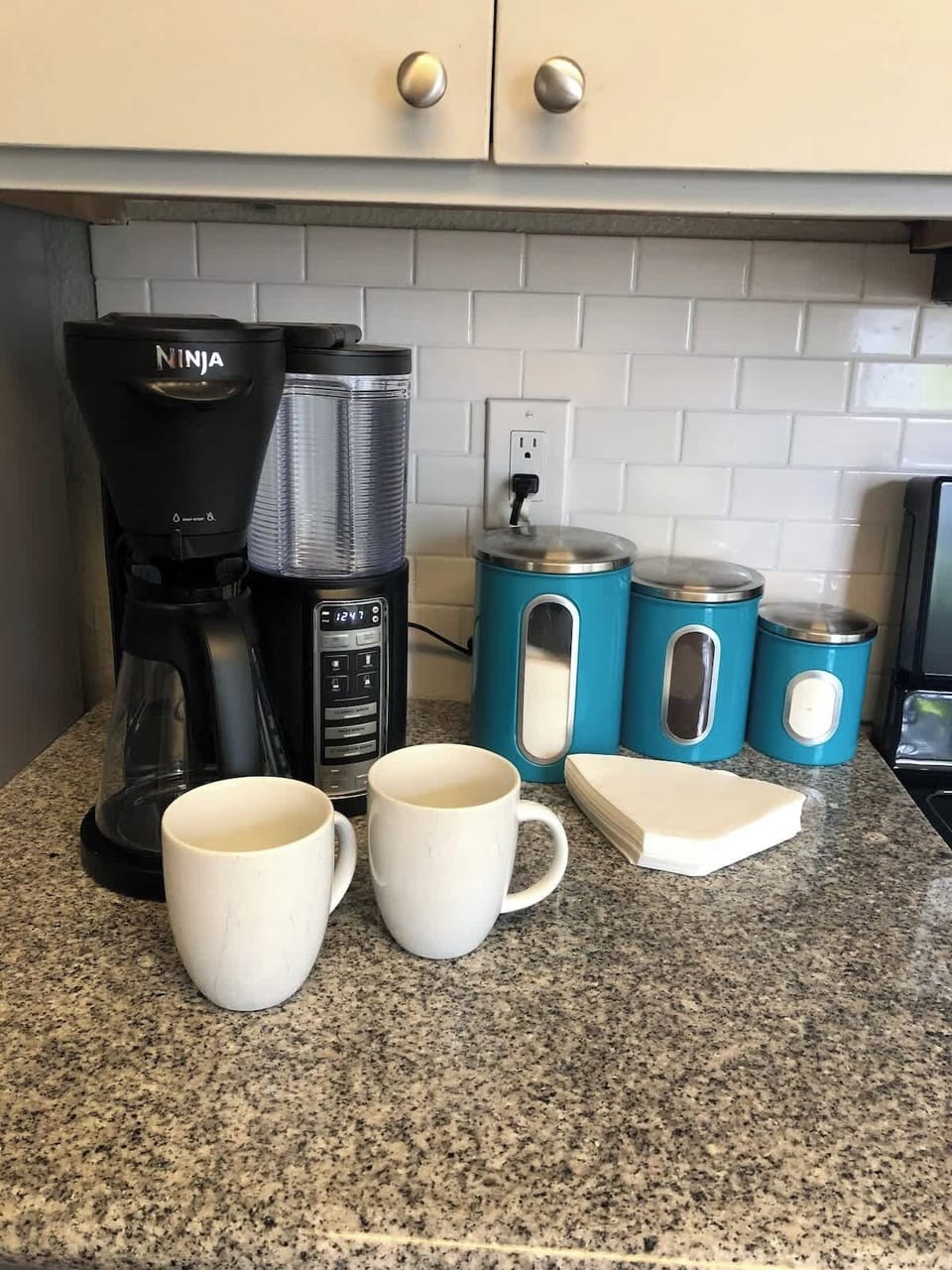 Kitchen has Costco coffee, creamer, and sugar is supplied
