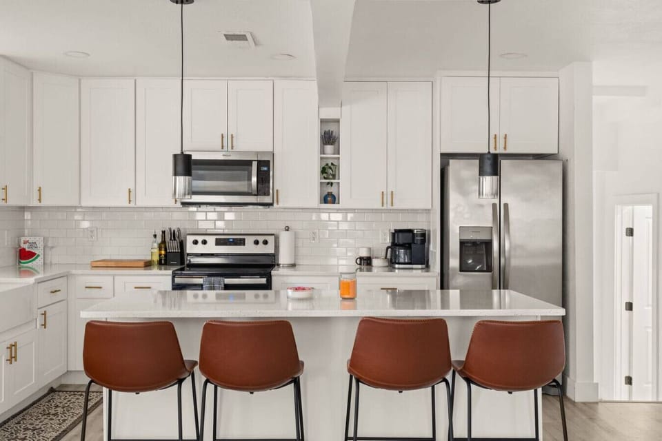 Sleek, fully equipped kitchen with stainless appliances