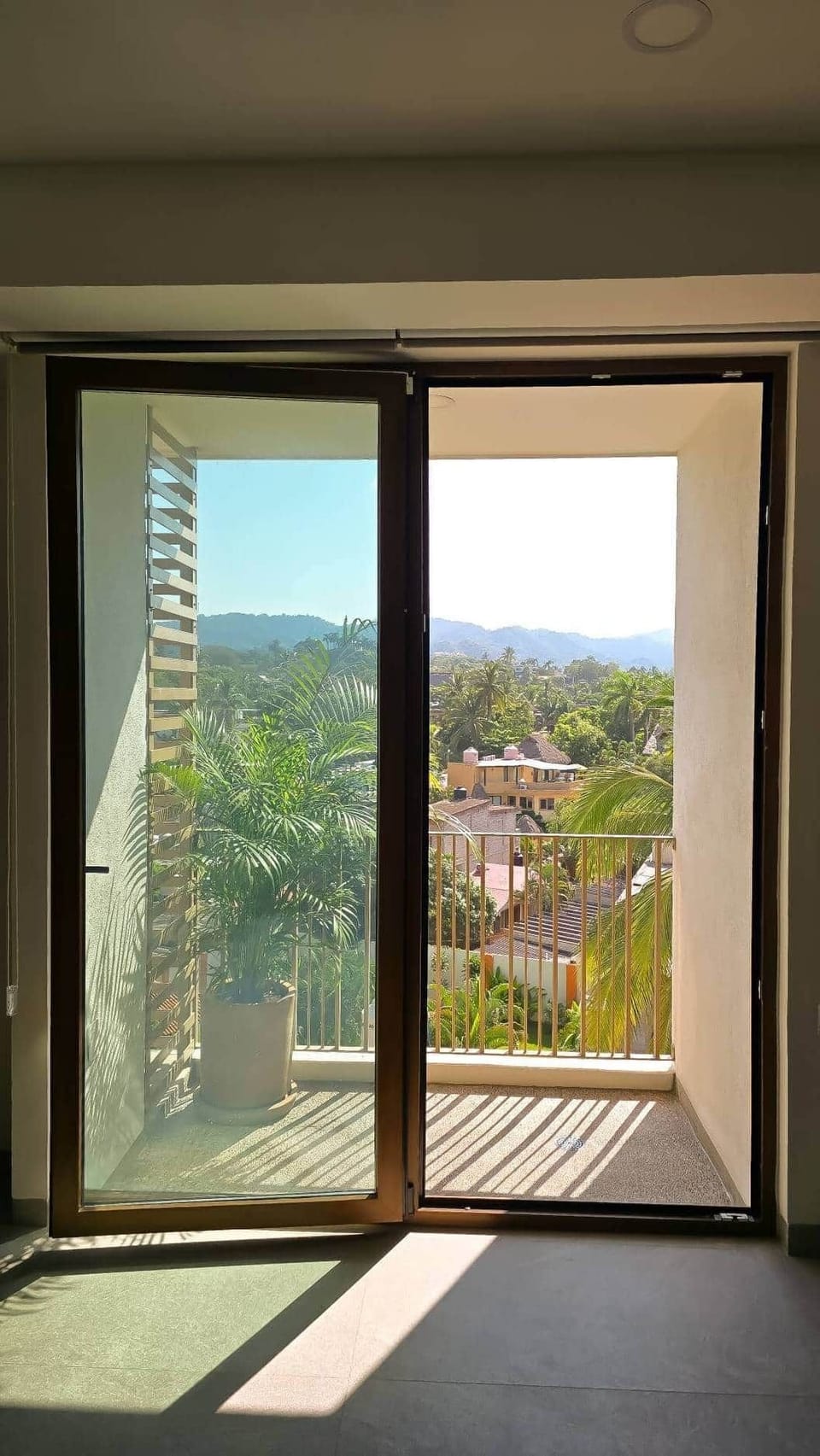 Private balcony with lush mountain views — your peaceful morning coffee spot.