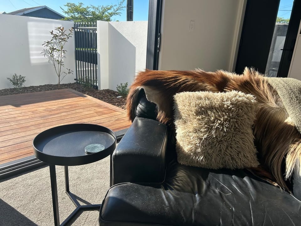 Relax in the sun, either inside or outside on the private deck 