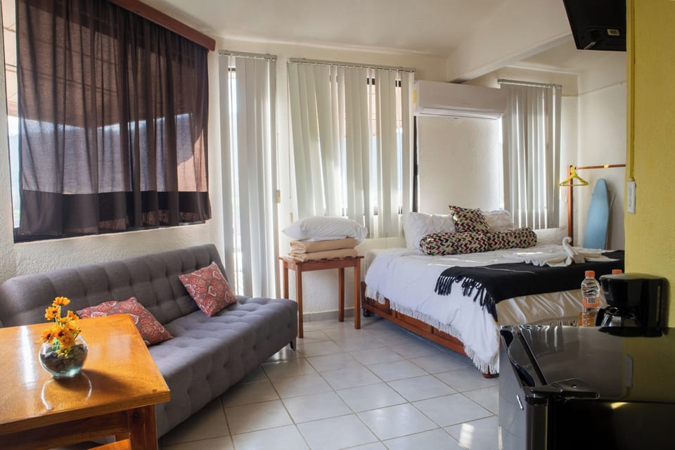 Junior Suite, City View | Desk, blackout drapes, iron/ironing board (on request), WiFi (free)