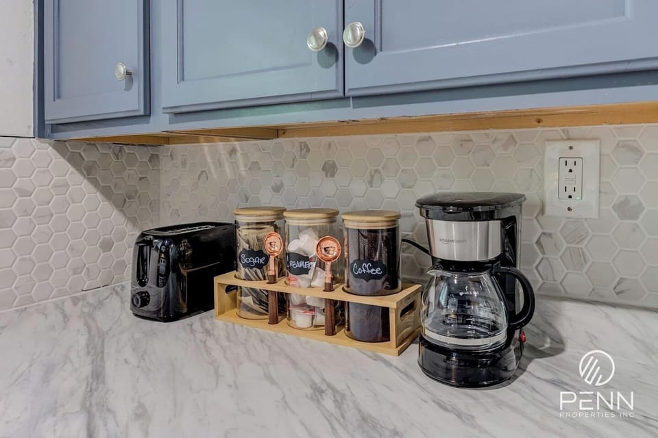 Start your morning right with fresh coffee in this bright, welcoming space.