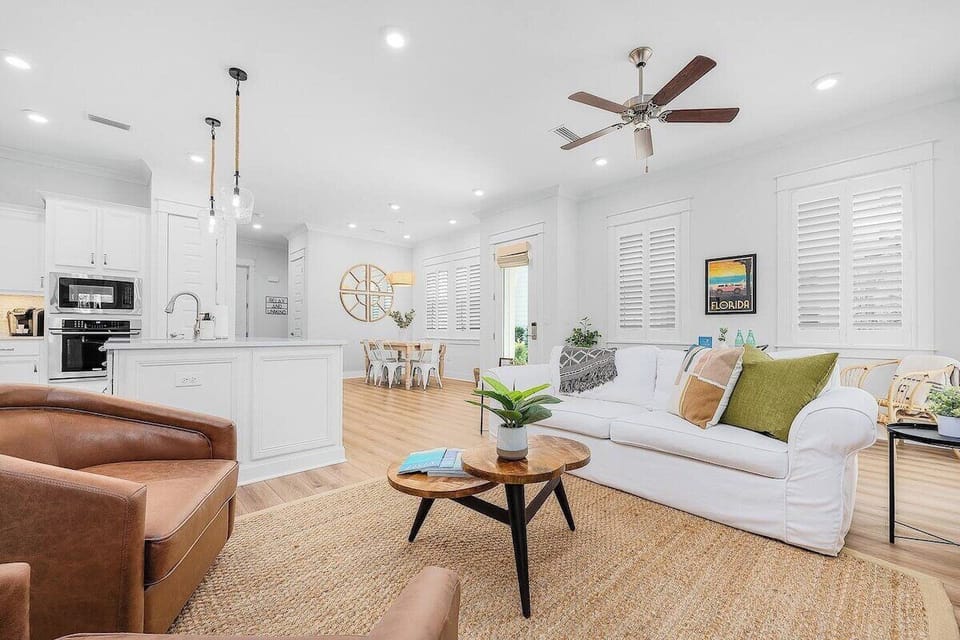 Living room space with ample seating to share in television viewing, game nights, and good conversation.