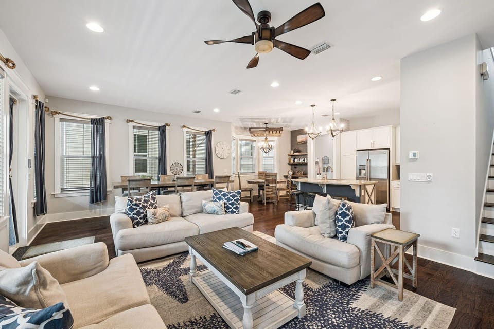Neutral tones and beach inspired decor welcome you into the space