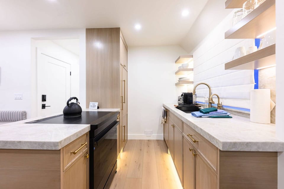 Kitchen with full-size appliances and counter space for meal preparation.