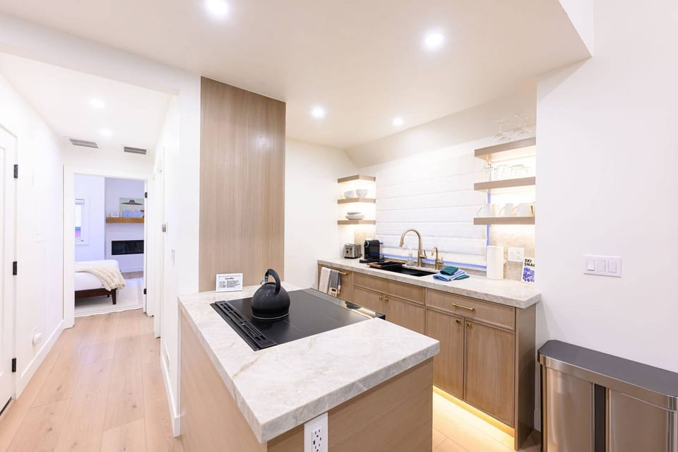 Kitchen with full-size appliances and counter space for meal preparation.