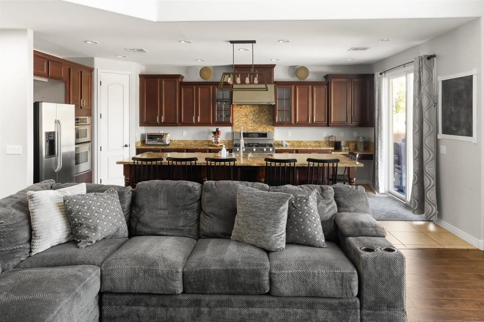 Stretch out, snuggle up, and stay awhile. This living room was designed for one thing: total relaxation (with a side of fun).