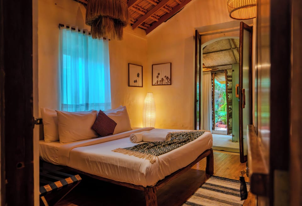 Double Room, Patio, Garden View | In-room safe, iron/ironing board, free WiFi, bed sheets