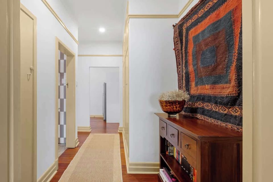 The hallway leading to kitchen + bathroom...