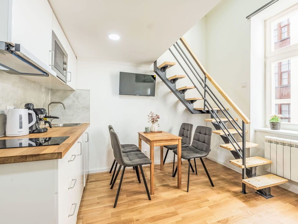 Flooring, Floor, Interior Design, Ceiling, Door, Stairs, Molding, Wood Stain, Handrail, Hardwood