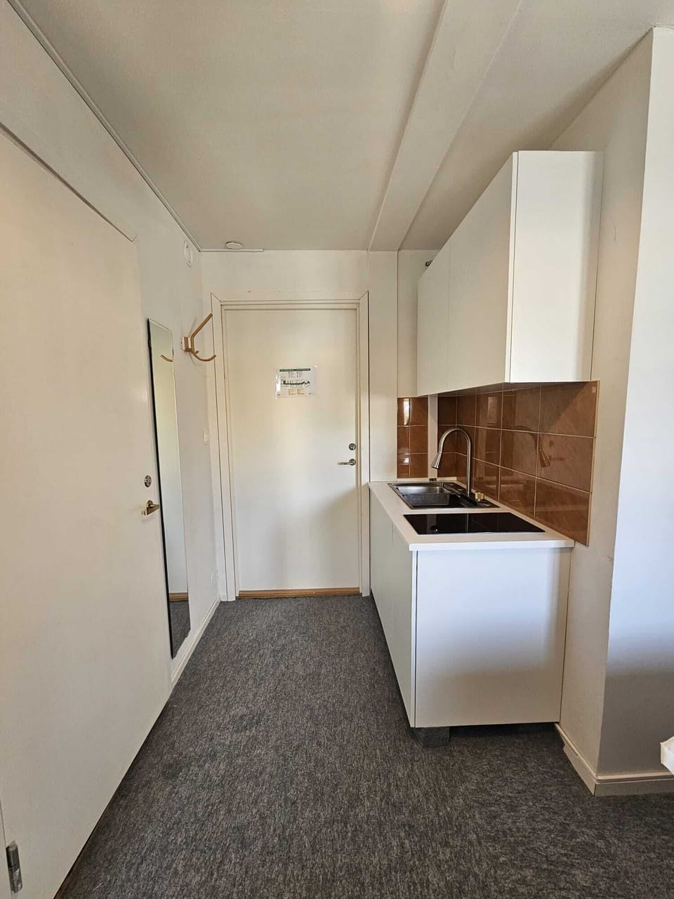 Full-size fridge, microwave, stovetop, cookware/dishes/utensils