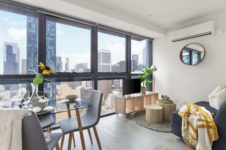 A tastefully furnished living area with city views.