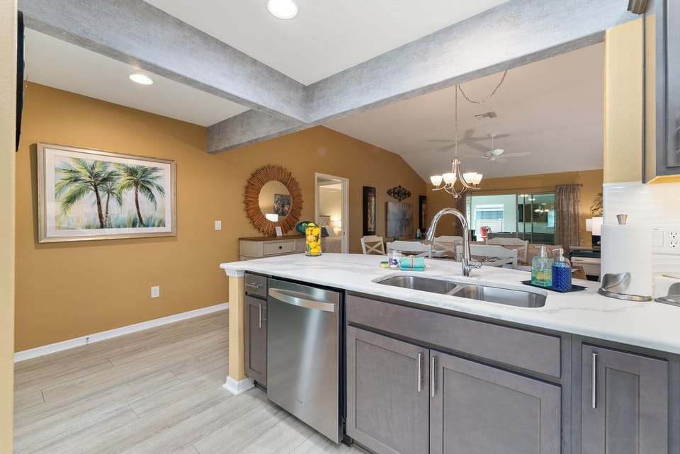 Large Sink w/ Detachable Faucet w/ Dishwasher, Overlooking the Open Common Area