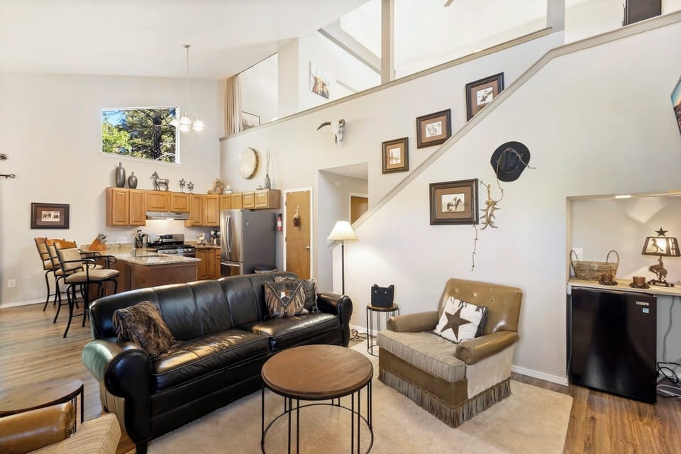 Open living room, kitchen and dining room.