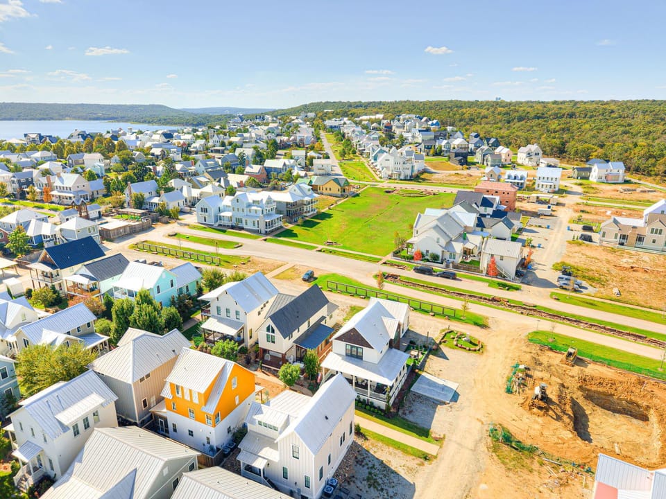 14. Wide community shot showcasing Carlton Landing’s walkable, park-filled neighborhood.