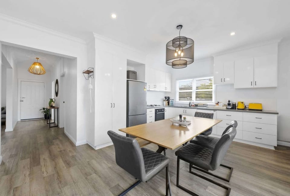 Light and bright open plan dining and kitchen space. 