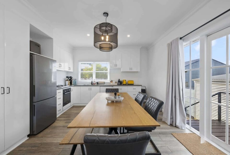 Light and bright open plan kitchen and dining space. 