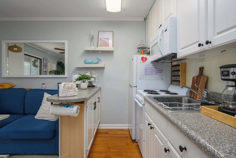 Compact and fully equipped kitchen for all your cooking needs.