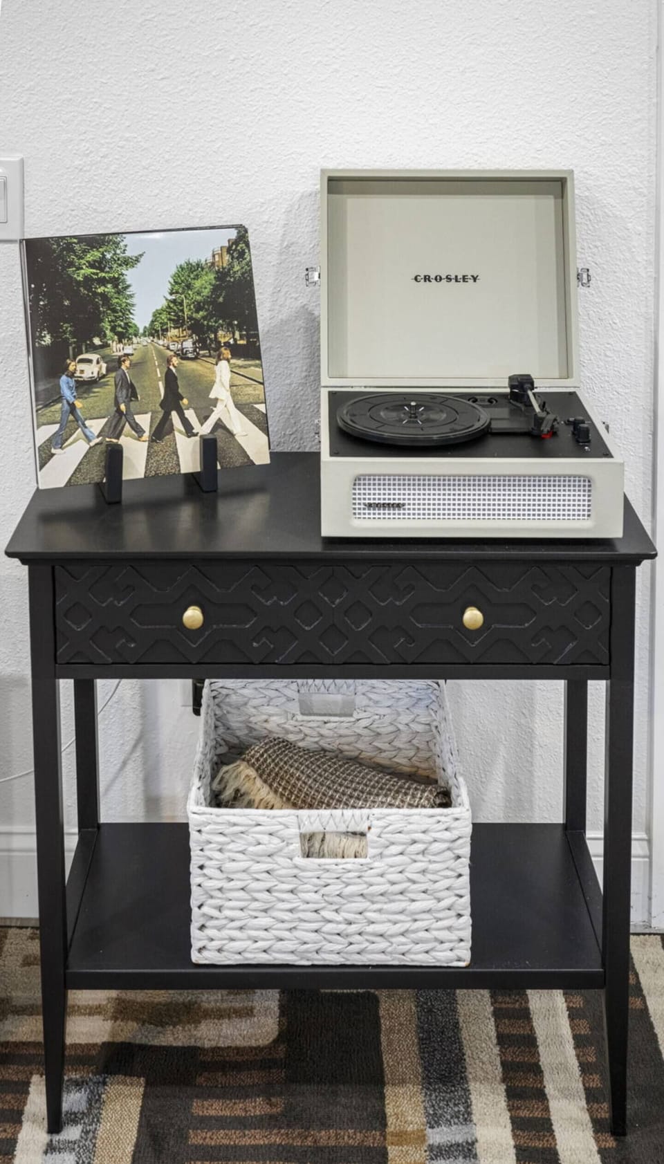 Enjoy your favorite tunes with our Crosley record player, a perfect touch of vintage charm for your stay.
