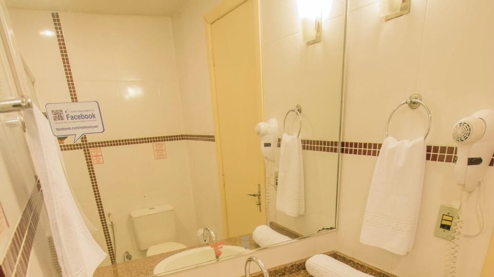 Refresh easily with bright vanity lighting and fluffy towels.