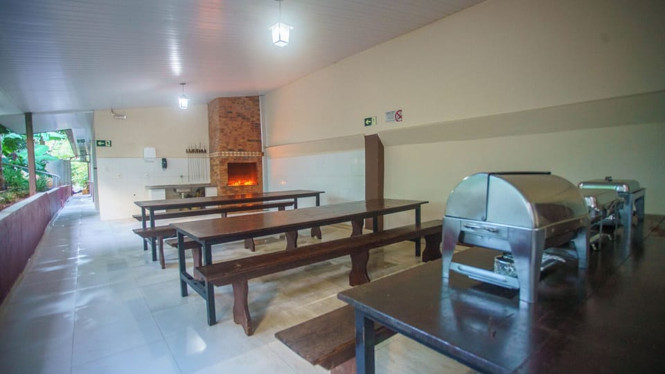 Host easy cookouts with built-in grill and communal tables.