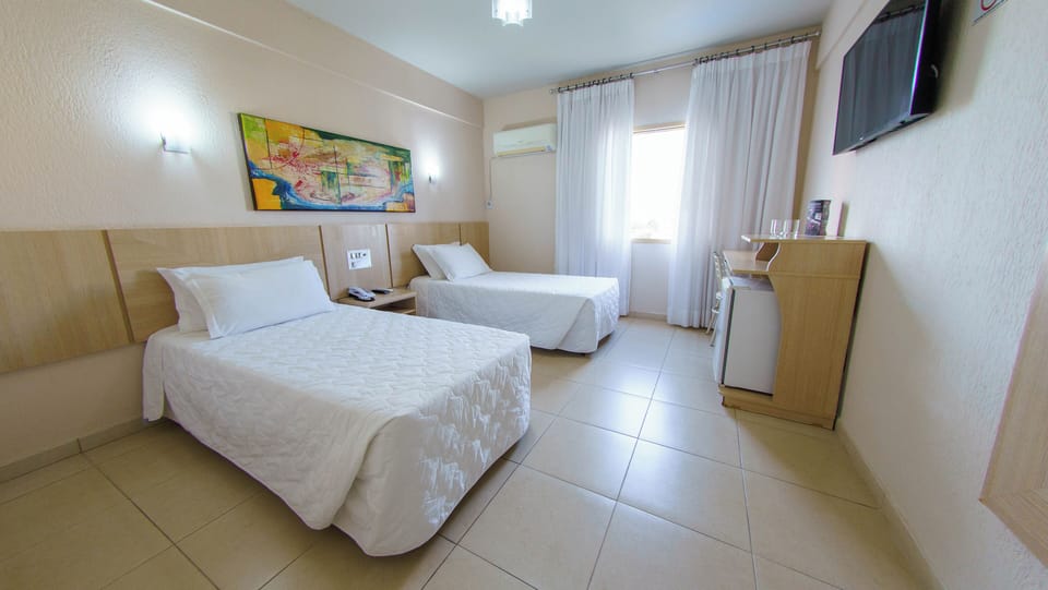 Unwind in a bright, spacious room with twin beds.