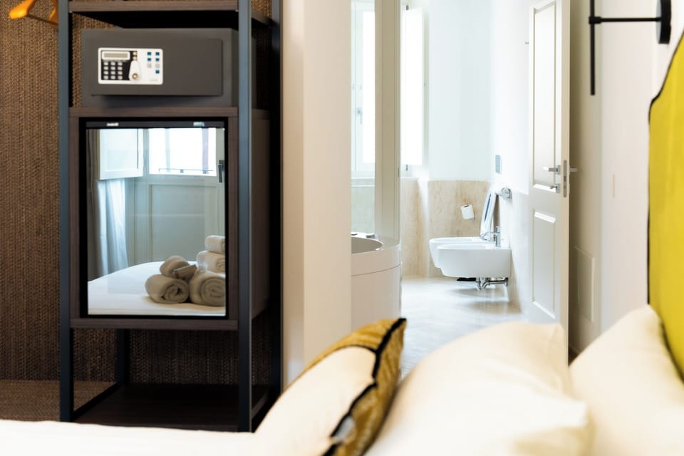 Luxury Suite, Balcony, City View | In-room safe, blackout drapes, soundproofing, free WiFi