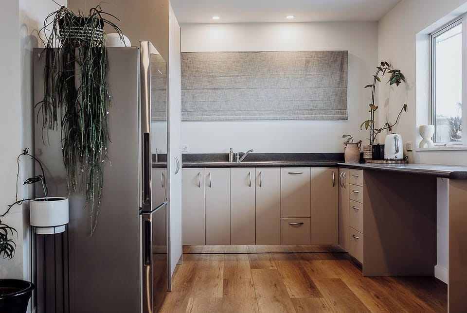 The downstairs kitchenette - quietly efficient, always welcoming.